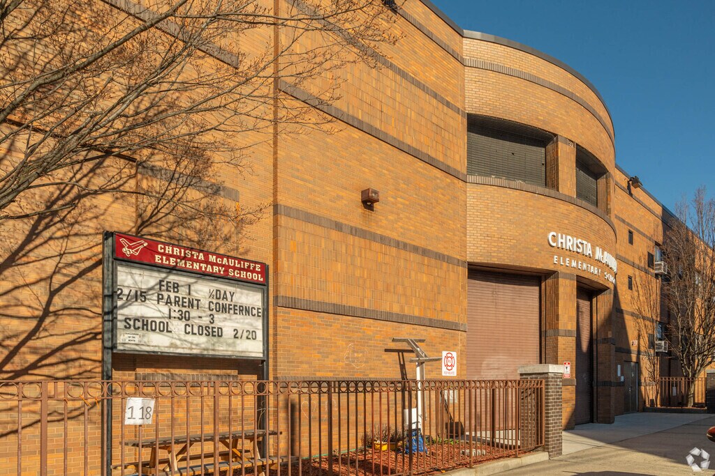 Signage and front entrance to Christa McAuliffe Elementary School.