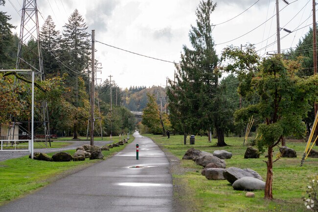 Residents of Hollybrook enjoy the paved paths at Linneman Station Park.