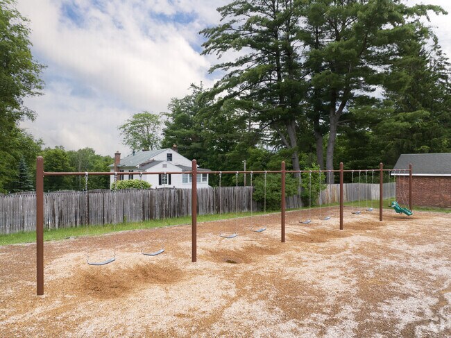 A long swing set at Donald P. Sutherland Elementary School.