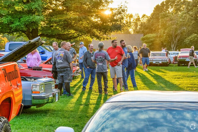 Car enthusiasts gather at a cruise-in at the Gilmore Car Museum near South Gull Lake.