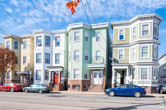 The vibrance of Central Maverick Square can be seen in its colorful homes.