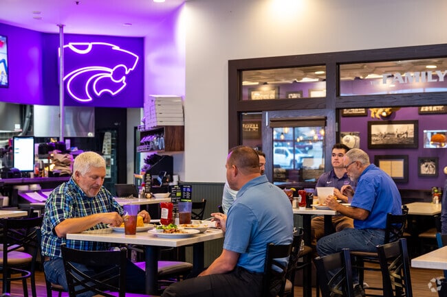Grab a bite to eat while watching  your favorite sports team at Powercats Sports Grill.