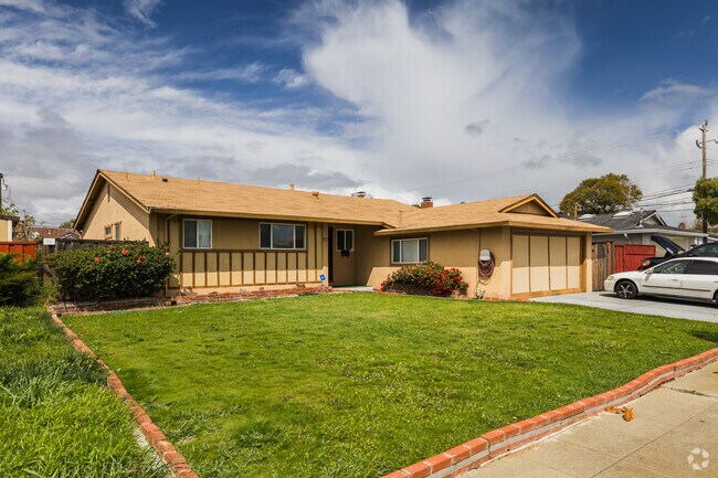 Sunlight bathes a beautiful Glen Eden home, highlighting neighborhood tranquility.