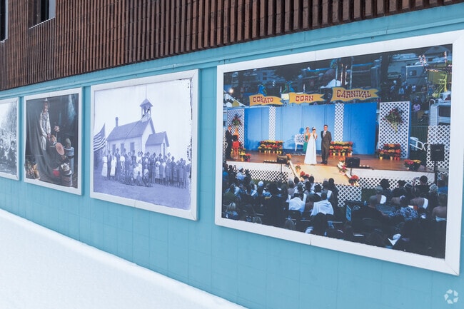 The Cokato Museum displays images throughout the town's history on its exterior walls.