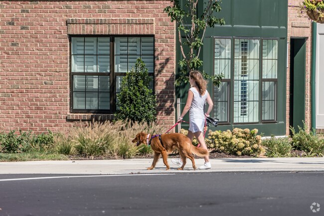 Resident walking their dog in Willow Lawn.