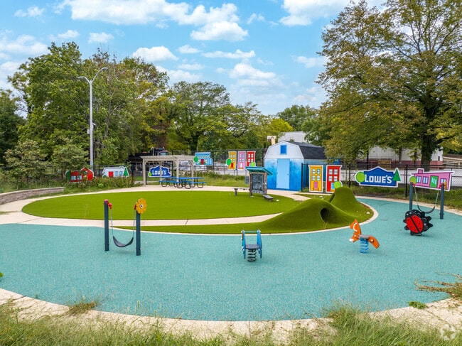 Play on the playground at Model Park, one of the many parks within a mile of The Terraces.