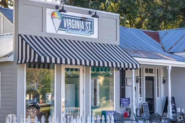 Locals enjoy hot dogs, nachos, and flavored ice at Zachary's Virginia St. Snowballs.