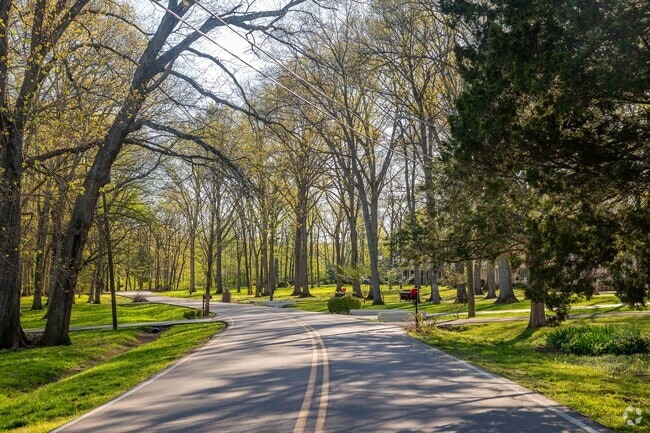 Otter Creek streets are tree-lined and quiet with minimal sidewalks.