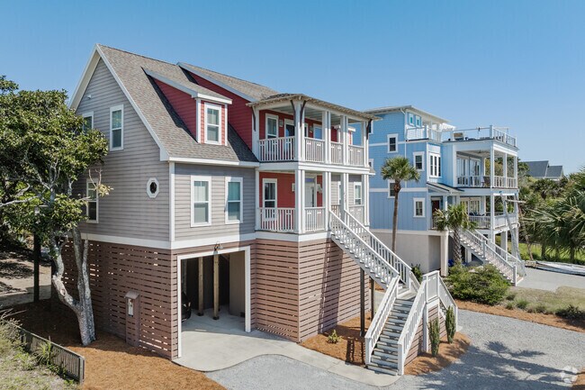 Folly Beach has gorgeous elevated colonial revival style homes with easy access to the beach.