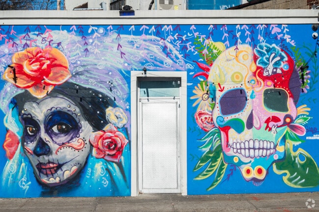 Spanish dominant East Elmhurst has many murals representing Hispanic culture.