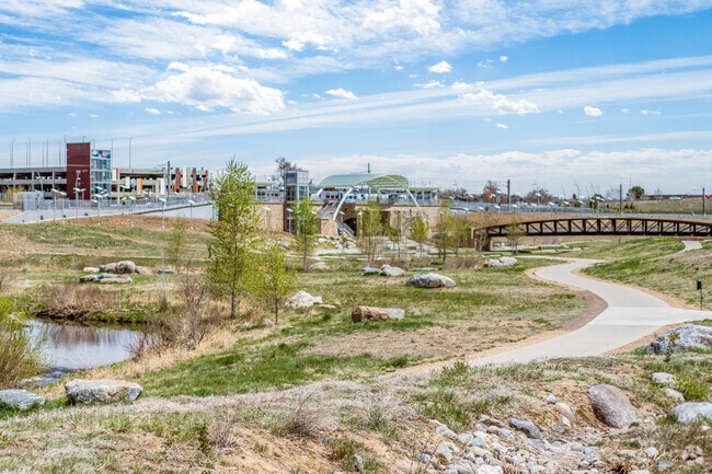 Westminster Station Park is a well-manicured park with a river and pathways.