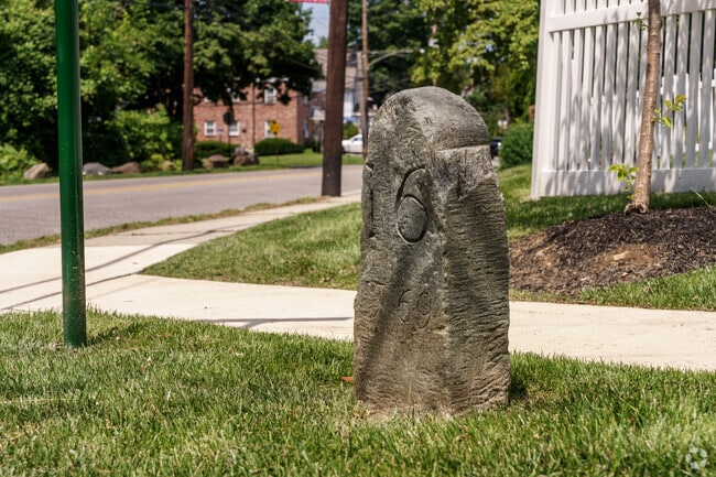 A stone marker from 1769 sits on a street corner in Radnor.