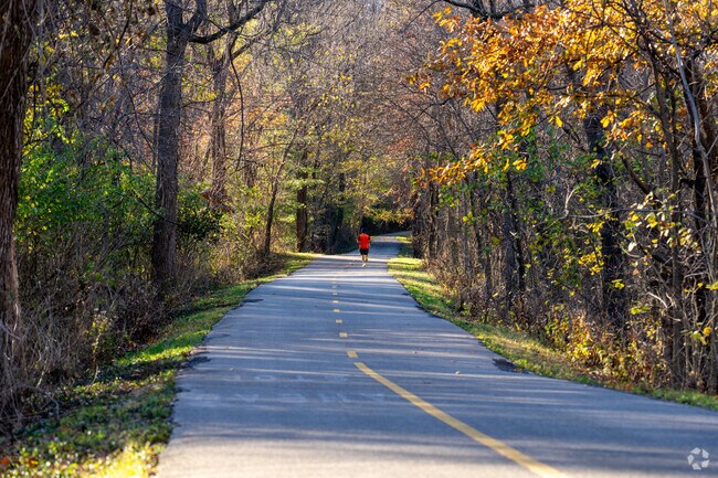 Watershed Trail links parks to downtown as part of the 138‑mile MCT network.