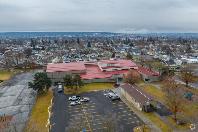 Longfellow Elementary features a parking lot for staff and visitors.