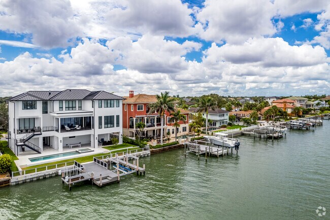 The Harbor Bluffs neighborhood offers a private dock and waterfront pool for each coastal residence.