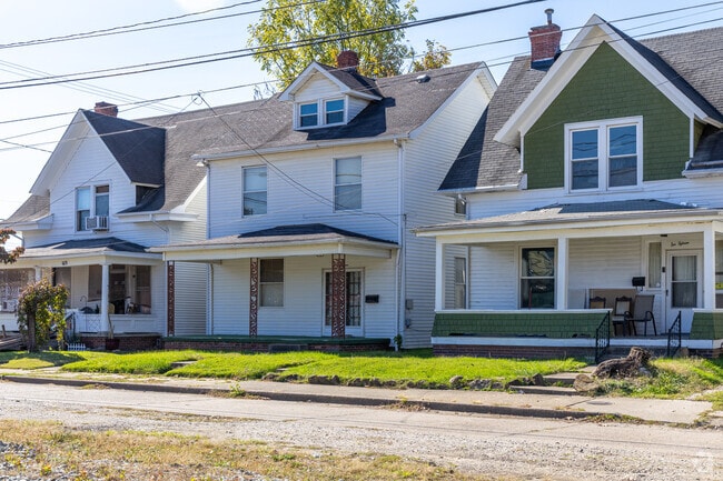 A row of traditional two-story homes in Downtown Huntington.