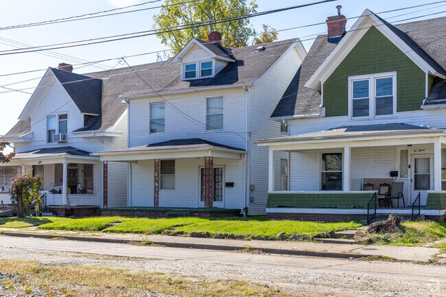 A row of Traditional two story homes found around the Downtown Huntington neighborhood.