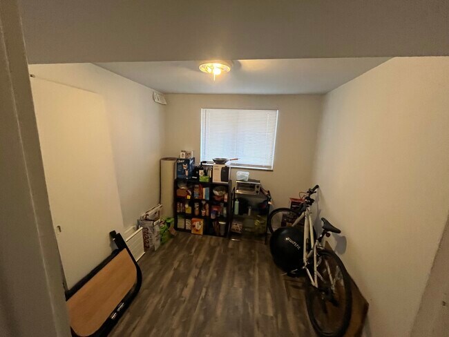 Extra room on first floor which could be used for an office space, storage, or guest bedroom.