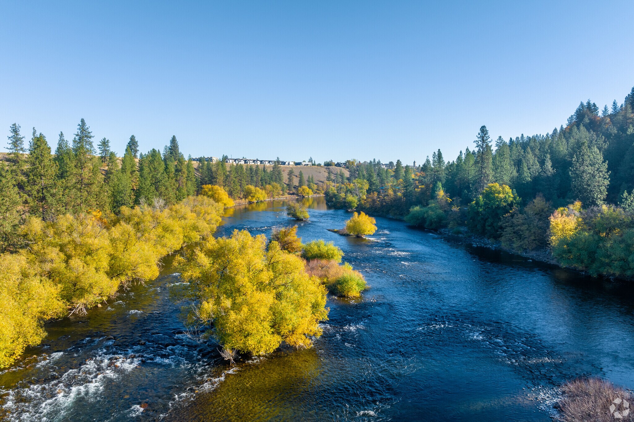 The Spokane river brings many people to the Peaceful Valley neighborhood.