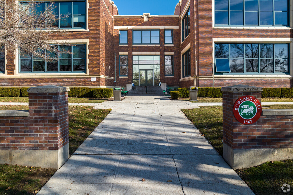 Rowland Hall has a symmetrical brick entrance.