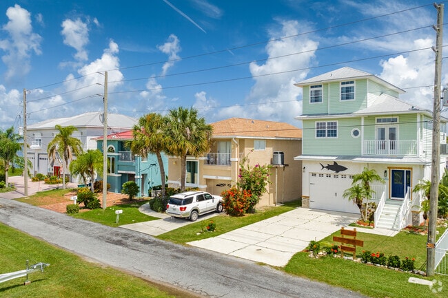 Sun-splashed, colorful homes can be found near and on the waterfront in Hudson.