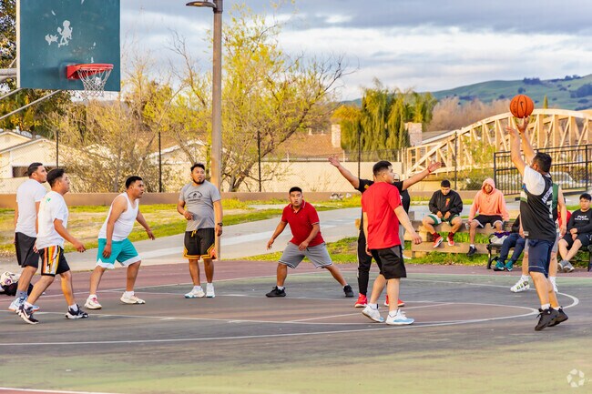 Enjoy a pick up basketball game at Plata Arroyo Park in Little Portugal.