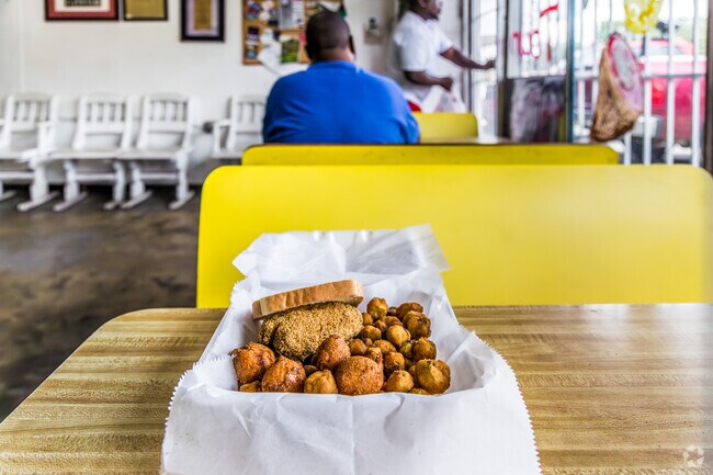 The catfish steak sandwich is a popular choice at Peter's Fish Market in Capitol View.