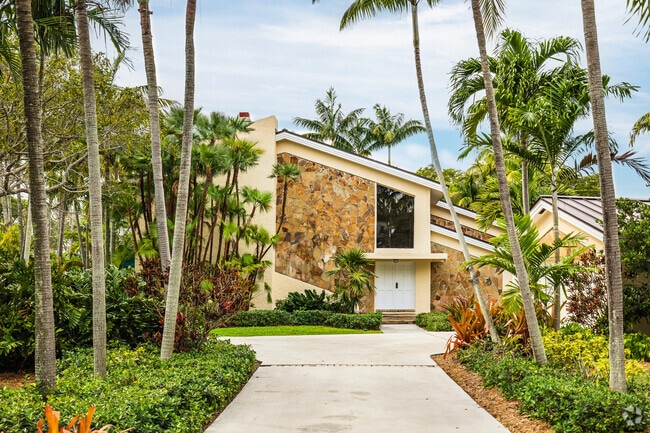 Live in a gorgeous Mid-Century style home in King's Bay/Deering Bay, FL.