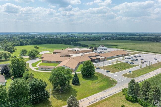 Randall Consolidated School has a large building with plenty of outdoor space for kids to play.