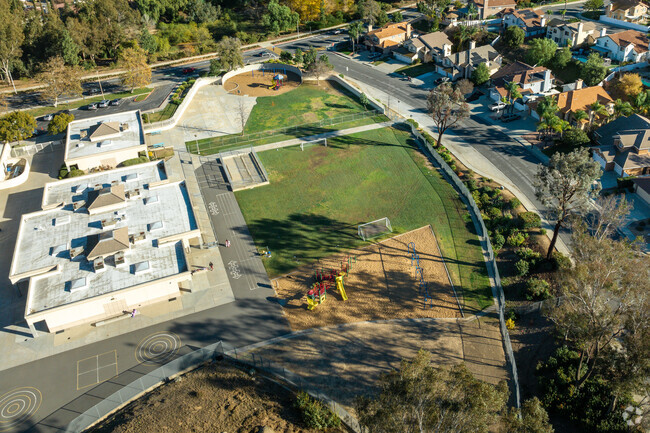 Kids love the grass fields at Hidden Springs Elementary School in Moreno Valley.