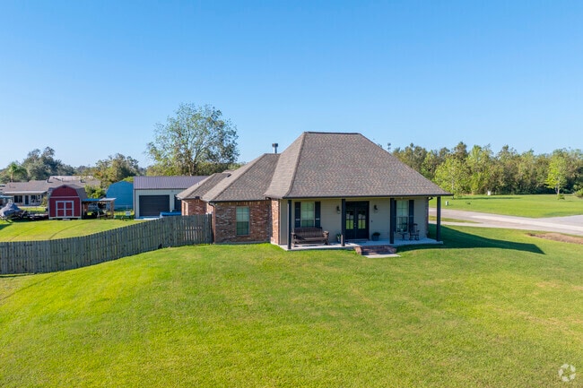 An Acadian style home with a large yard on Texas Gulf Rd in Bourg.