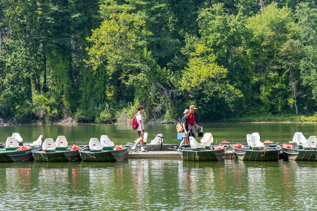 Fisherman walking back from a day out on Loch Raven Reservoir.