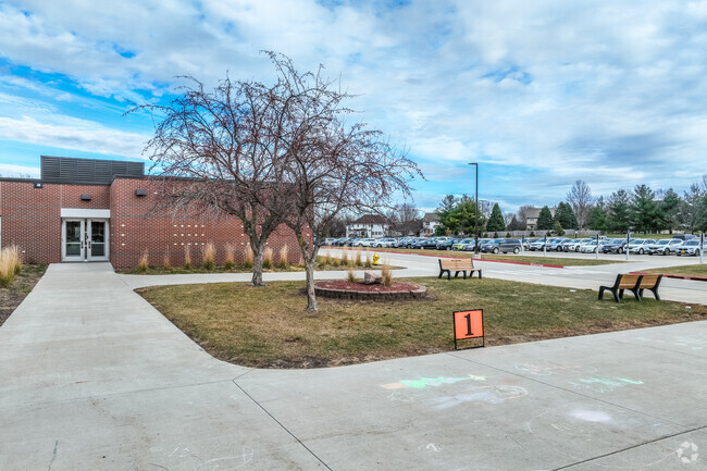 The pickup/drop-off area of Eason Elementary School is well marked and organized.