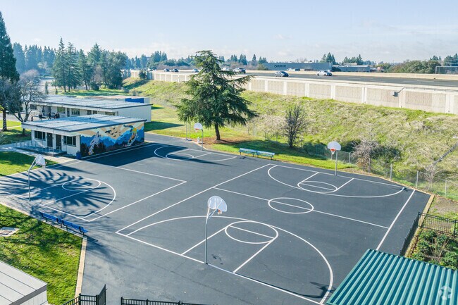 Play basketball at Kinney High (Continuation) School