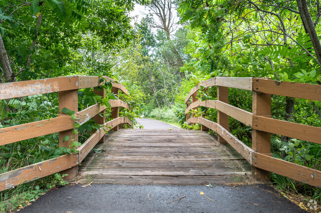 Cross over a pedestrian bridge to get to Keene Creek Dog Park in Fairmount.
