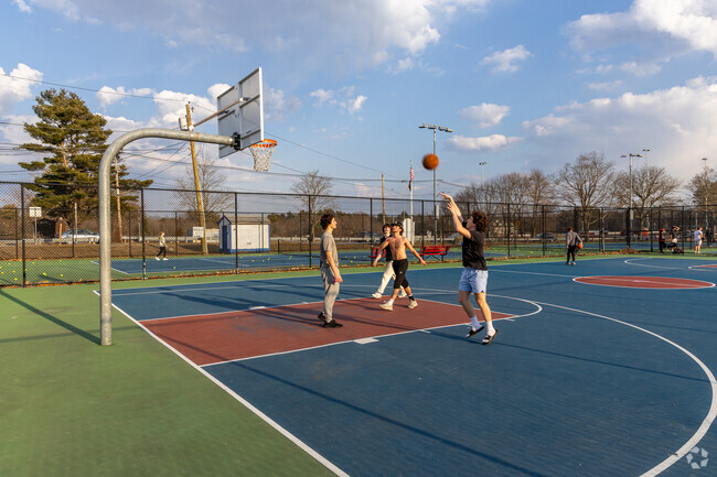 Livingston Street Playground has several basketball, tennis courts, and more in Tewksbury, MA.