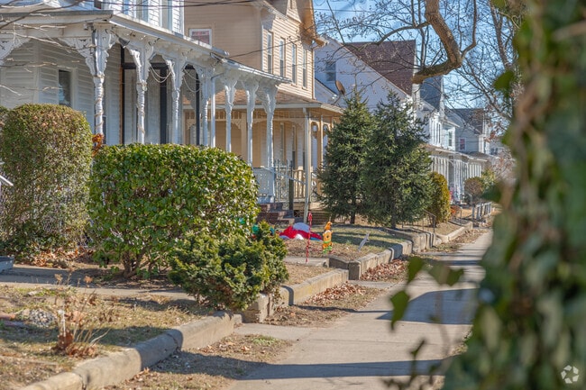 Quiet sidewalks are accompanied by Victorian accents on covered front porches in Bridgeton.