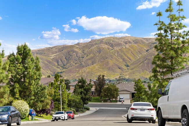 Experience the best of suburban living with mountain views in Horsethief Canyon Ranch.