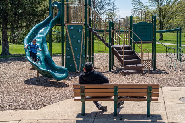 Indian Creek resident spends time with his little one at Church Road Park.