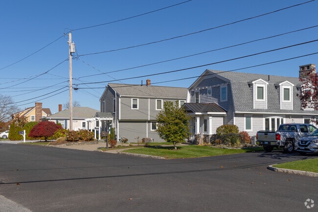 This row of stately homes in Northeast Bristol - Kickemuit lie by the Kickemuit River.