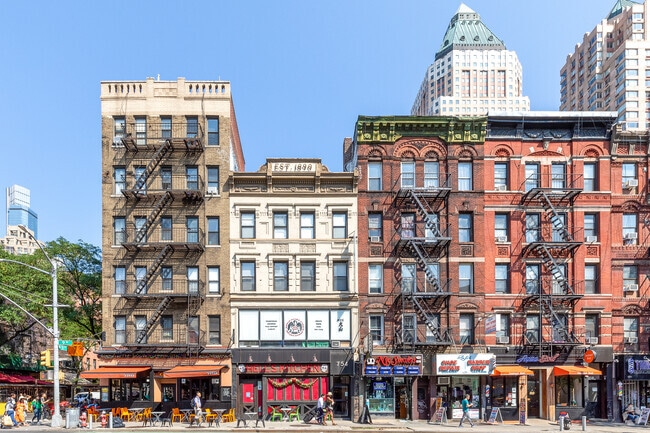 Beaux-Arts walkups with wrought-iron fire escapes can be seen throughout Hell's Kitchen.