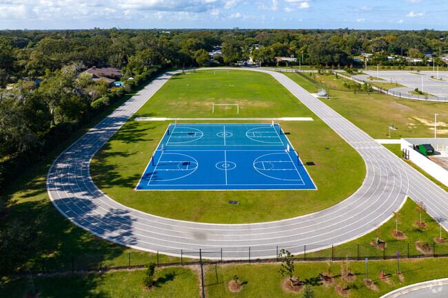 Pershing School features a large track and sports fields for students to enjoy and stay active.