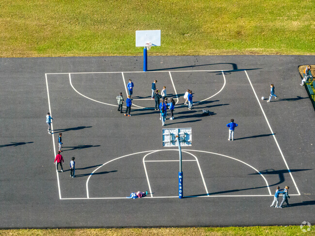 Children can play on the basketball court at Wilson Elementary School.