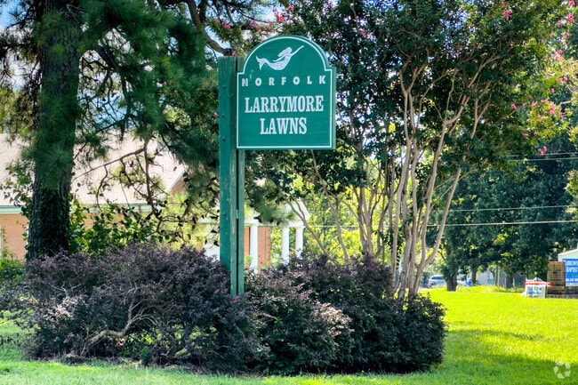 The Larrymore Lawns community is welcomed by a sign featuring Norfolk’s mermaid emblem.