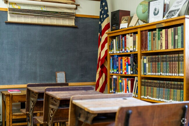 Goodland Township has a historical school house with old desks.