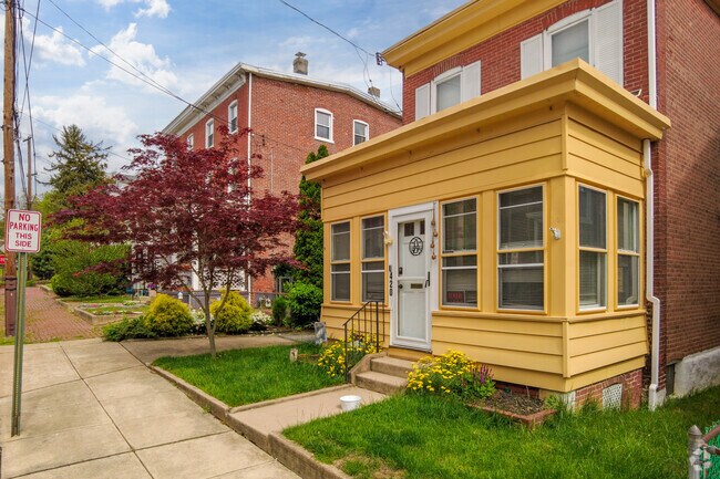 A colorful front porch in Delaware County's Upland neighborhood.