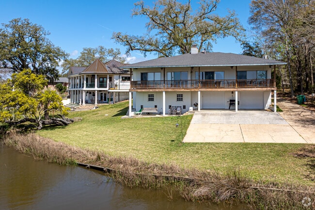 Large homes with waterfront views are common in Gulf Park Estates.