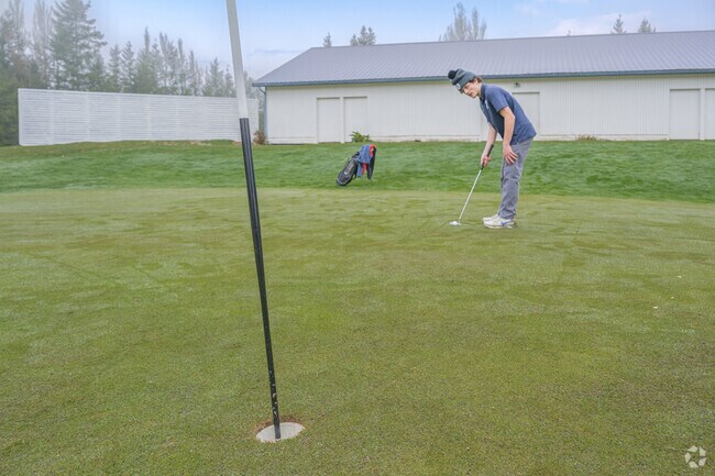 Work on your game at Blue Boy West Golf Course near The Farm at Woods Creek.
