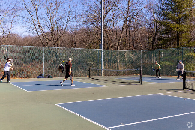 Residents enjoy a competitive game of pickle ball at East Brunswick Community Park in Dunhams Corner.