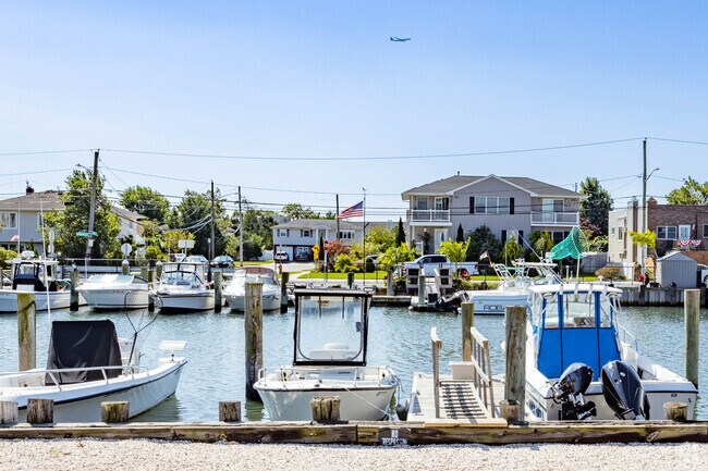 Various canals run through Barnum Island with waterfront homes on them.